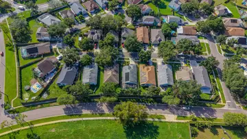 Aerial view of a neighborhood block of homes