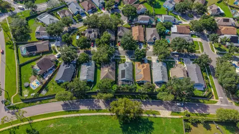 Aerial view of a neighborhood block of homes