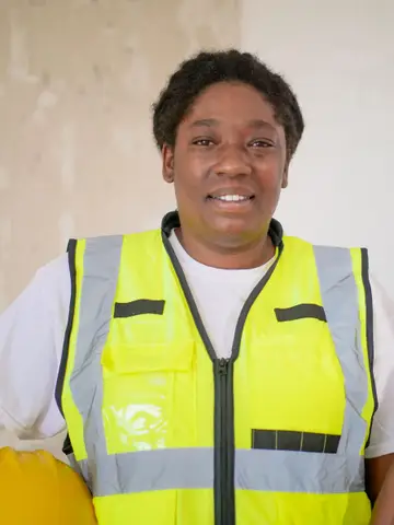 Smiling worker in a reflective vest