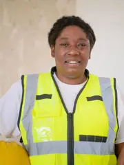 Smiling worker in a reflective vest