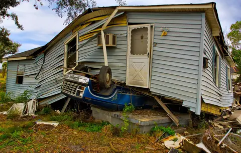 Home knocked off its foundation after a storm